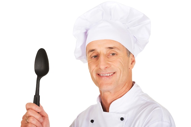 Šťastný kuchár pri varení
